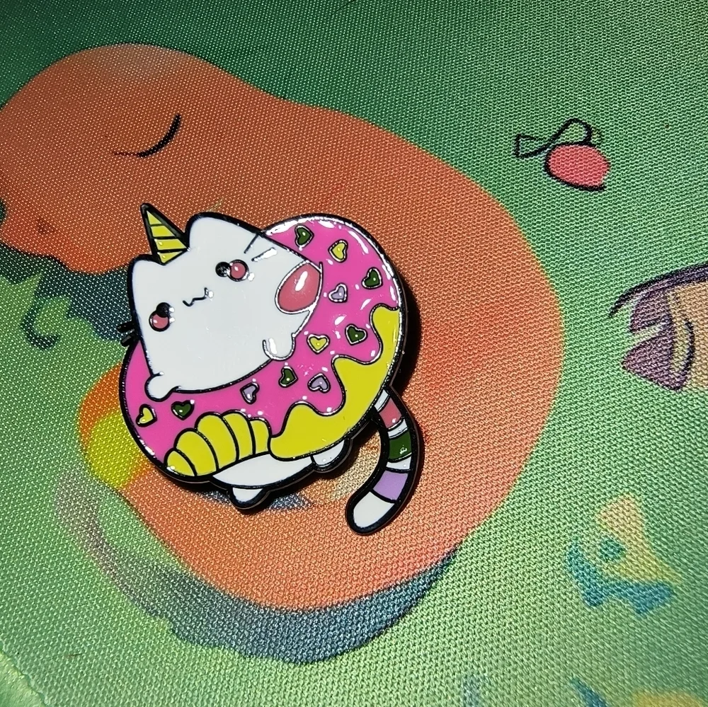 Cute Cat Enamel Pin with Pink Donut Design